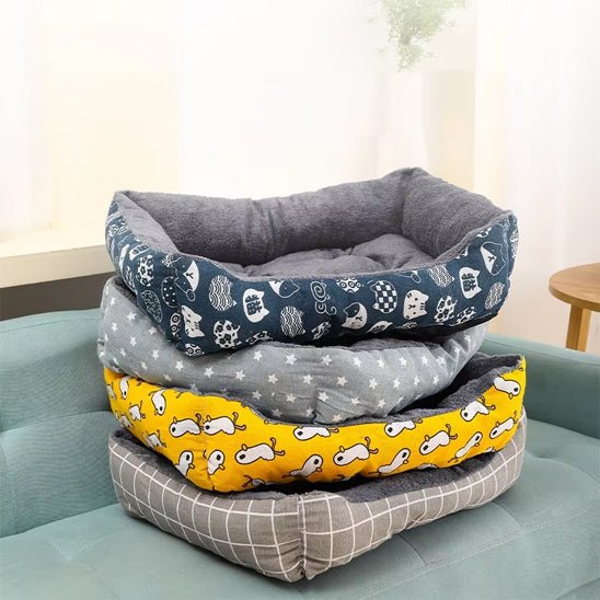 quatre paniers chat empiles